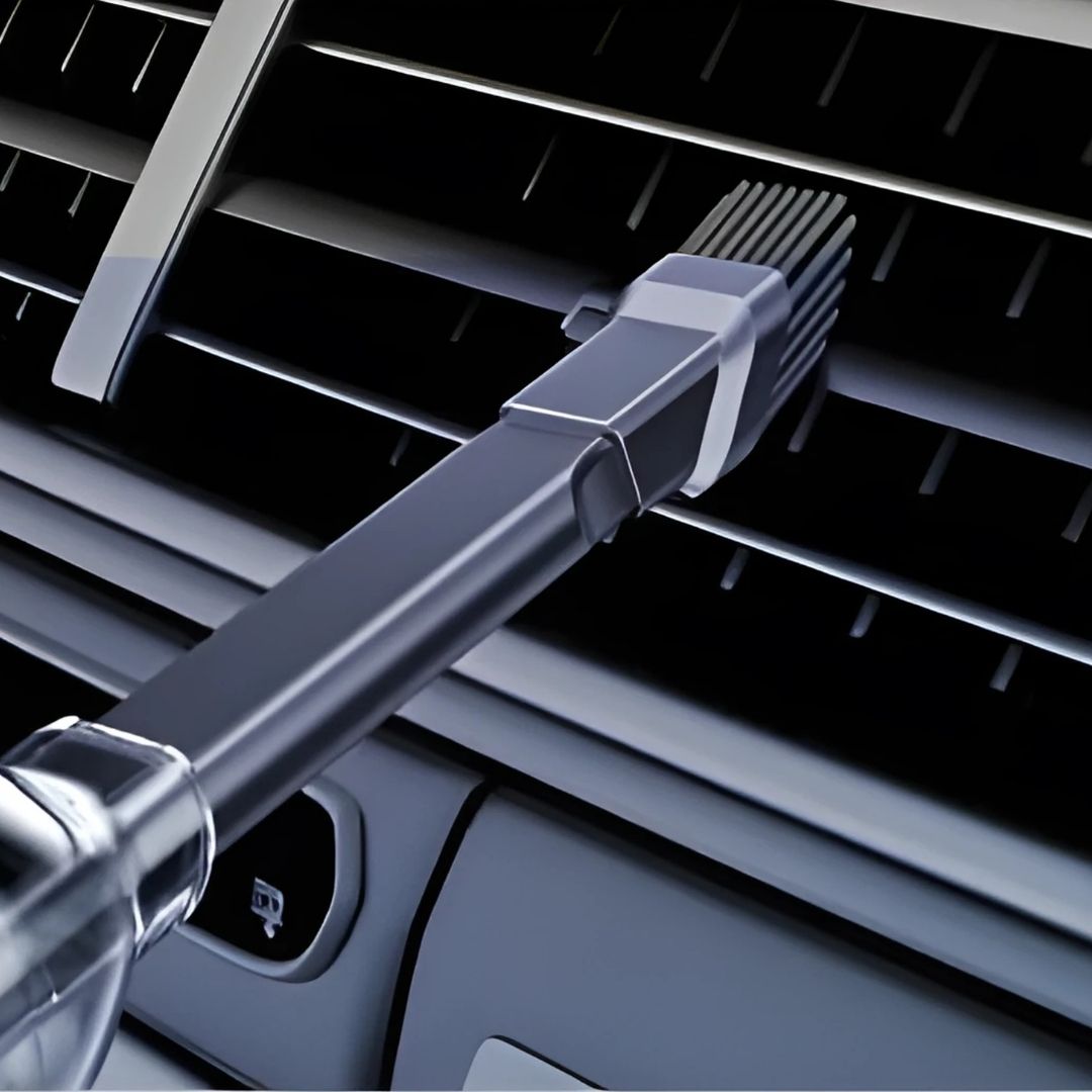 Mise en situation sur une grille de ventilation de l'aspirateur voiture sans fil SZUK
